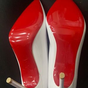 White Christian Louboutin heels never worn